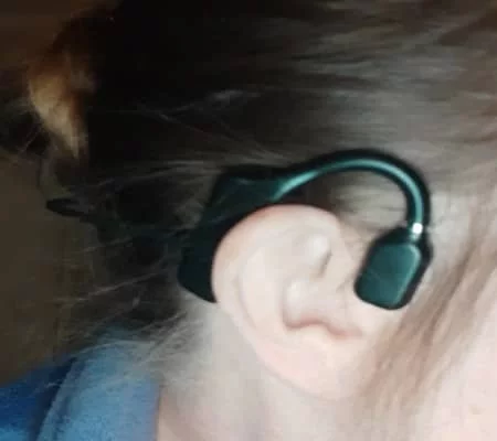 lady wearing Melody Buds zoom in ear