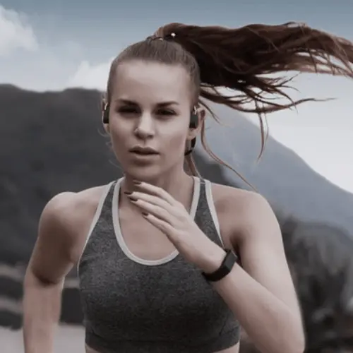 lady running with waterproof Melody Buds